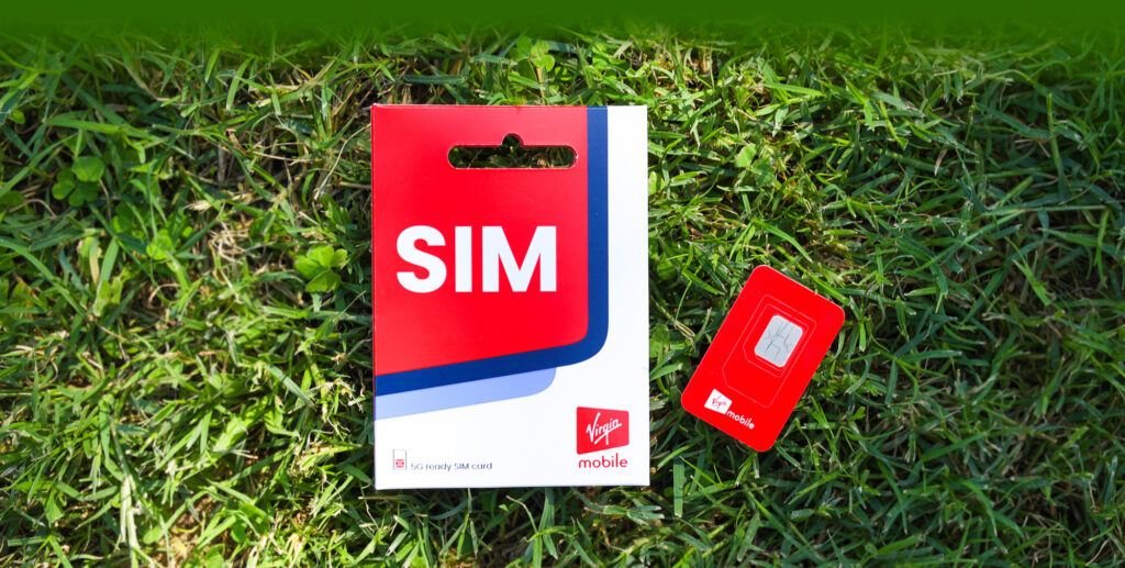Virgin Mobile's biodegradable SIM card and pack using Workz’s EcoSIM and recyclable paper pack on green grass